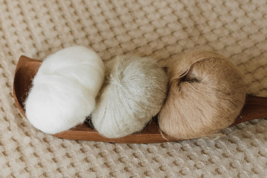 image shows three yarns made of cotton